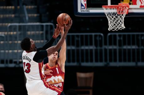 Miami Heat center Bam Adebayo (13) drives to the net against Denver Nuggets forward Michael Porter Jr. (1)
(Isaiah J. Downing-USA TODAY Sports)