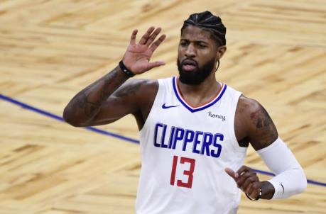 ORLANDO, FLORIDA - JANUARY 29: Paul George #13 of the LA Clippers reacts during the first quarter against the Orlando Magic at Amway Center on January 29, 2021 in Orlando, Florida. NOTE TO USER: User expressly acknowledges and agrees that, by downloading and or using this photograph, User is co<em></em>nsenting to the terms and co<em></em>nditions of the Getty Images License Agreement. (Photo by Douglas P. DeFelice/Getty Images)