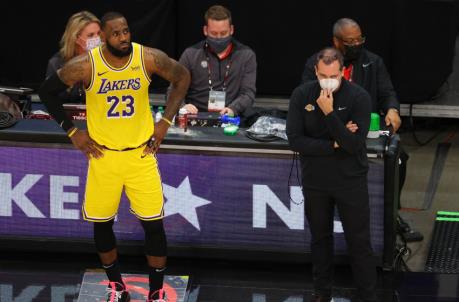 ATLANTA, GEORGIA - FEBRUARY 01: Head coach Frank Vogel of the Los Angeles Lakers stands with LeBron James #23 against the Atlanta Hawks during the second half at State Farm Arena on February 01, 2021 in Atlanta, Georgia. NOTE TO USER: User expressly acknowledges and agrees that, by downloading and or using this photograph, User is co<em></em>nsenting to the terms and co<em></em>nditions of the Getty Images License Agreement. (Photo by Kevin C. Cox/Getty Images)