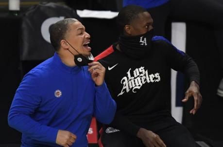 LOS ANGELES, CA - APRIL 18: Coach Tyronn Lue and Rajon Ro<em></em>ndo #4 of the Los Angeles Clippers on the sideline during the second half of the game against Minnesota Timberwolves at Staples Center on April 18, 2021 in Los Angeles, California. NOTE TO USER: User expressly acknowledges and agrees that, by downloading and or using this photograph, User is co<em></em>nsenting to the terms and co<em></em>nditions of the Getty Images License Agreement. (Photo by Kevork Djansezian/Getty Images)