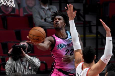 Miami Heat forward Jimmy Butler (22) drives to the basket on Portland Trail Blazers center Enes Kanter (11)
(Steve Dykes-USA TODAY Sports)