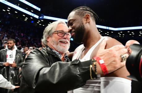 Dwyane Wade #3 of the Miami Heat hugs Miami Heat owner Micky Arison after the game against the Brooklyn Nets
(Photo by Sarah Stier/Getty Images)