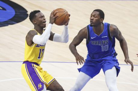 Apr 22, 2021; Dallas, Texas, USA; Los Angeles Lakers guard Dennis Schroder (17) shoots as Dallas Mavericks forward Dorian Finney-Smith (10) defends during the fourth quarter at American Airlines Center. Mandatory Credit: Kevin Jairaj-USA TODAY Sports