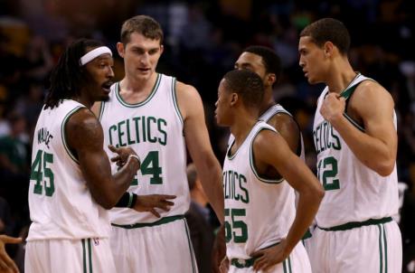 BOSTON, MA - OCTOBER 22: Gerald Wallace #45 of the Boston Celtics talks to teammates Tyler Zeller #44, Tim Frazier #55 and Dwight Powell #12 in a game against the Brooklyn Nets during a preseason game at TD Garden on October 22, 2014 in Boston, Massachusetts. NOTE TO USER: User expressly acknowledges and agrees that, by downloading and or using this photograph, User is co<em></em>nsenting to the terms and co<em></em>nditions of the Getty Images License Agreement. (Photo by Mike Lawrie/Getty Images)