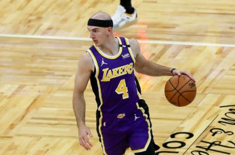 ORLANDO, FL - APRIL 26: Alex Caruso #4 of the Los Angeles Lakers controls the ball against the Orlando Magic at Amway Center on April 26, 2021 in Orlando, Florida. NOTE TO USER: User expressly acknowledges and agrees that, by downloading and or using this photograph, User is co<em></em>nsenting to the terms and co<em></em>nditions of the Getty Images License Agreement. (Photo by Alex Menendez/Getty Images)