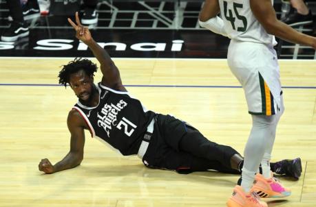 Feb 19, 2021; Los Angeles, California, USA; Los Angeles Clippers guard Patrick Beverley (21) signals for two free throws after he was fouled by Utah Jazz guard Do<em></em>novan Mitchell (45) in the first quarter of the game at Staples Center. Mandatory Credit: Jayne Kamin-Oncea-USA TODAY Sports