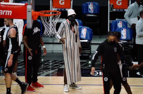 Apr 4, 2021; Los Angeles, California, USA; Los Angeles Clippers center Serge Ibaka (9) during a time out against the Los Angeles Lakers in the first half at Staples Center. Mandatory Credit: Gary A. Vasquez-USA TODAY Sports