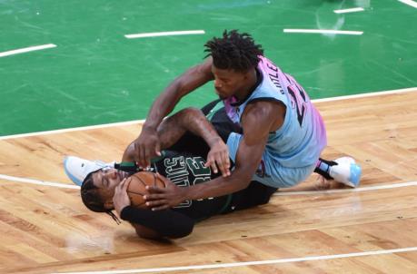 Boston Celtics guard Marcus Smart (36) battles for the ball with Miami Heat forward Jimmy Butler (22) (Bob DeChiara-USA TODAY Sports)