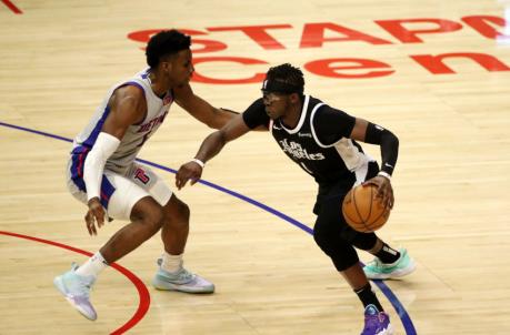 LOS ANGELES, CALIFORNIA - APRIL 11: Reggie Jackson #1 of the Los Angeles Clippers drives to the basket against Hamidou Diallo #6 of the Detroit Pistons during the second quarter at Staples Center on April 11, 2021 in Los Angeles, California. NOTE TO USER: User expressly acknowledges and agrees that, by downloading and or using this photograph, User is co<em></em>nsenting to the terms and co<em></em>nditions of the Getty Images License Agreement. (Photo by Katelyn Mulcahy/Getty Images)