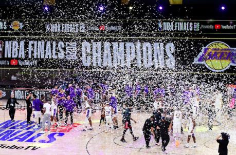 LAKE BUENA VISTA, FLORIDA - OCTOBER 11: The Los Angeles Lakers celebrate with the trophy after winning the 2020 NBA Champio<em></em>nship Final over the Miami Heat in Game Six of the 2020 NBA Finals at AdventHealth Arena at the ESPN Wide World Of Sports Complex on October 11, 2020 in Lake Buena Vista, Florida. NOTE TO USER: User expressly acknowledges and agrees that, by downloading and or using this photograph, User is co<em></em>nsenting to the terms and co<em></em>nditions of the Getty Images License Agreement. (Photo by Douglas P. DeFelice/Getty Images)