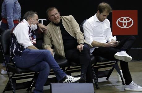 Houston Rockets owner Tilman Fertitta, center, team president Tad Brown, left and Patrick Fertitta (Photo by Bob Levey/Getty Images)