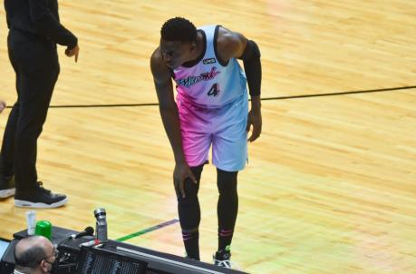 Victor Oladipo #4 of the Miami Heat holds his right knee after being injured in the second half
(Photo by Eric Espada/Getty Images)