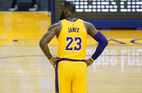 SAN FRANCISCO, CALIFORNIA - MARCH 15: LeBron James #23 of the Los Angeles Lakers looks on against the Golden State Warriors during the second half of an NBA basketball game at Chase Center on March 15, 2021 in San Francisco, California. NOTE TO USER: User expressly acknowledges and agrees that, by downloading and or using this photograph, User is co<em></em>nsenting to the terms and co<em></em>nditions of the Getty Images License Agreement. (Photo by Thearon W. Henderson/Getty Images)