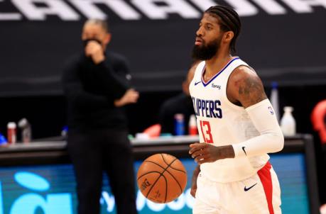 TAMPA, FLORIDA - MAY 11: Paul George #13 of the LA Clippers looks to pass during a game against the Toro<em></em>nto Raptors at Amalie Arena on May 11, 2021 in Tampa, Florida. (Photo by Mike Ehrmann/Getty Images) NOTE TO USER: User expressly acknowledges and agrees that, by downloading and or using this photograph, User is co<em></em>nsenting to the terms and co<em></em>nditions of the Getty Images License Agreement.