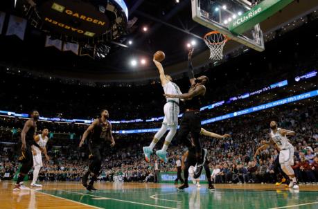 May 27, 2018; Boston, MA, USA; Boston Celtics forward Jayson Tatum (0) dunks and scores against Cleveland Cavaliers forward LeBron James (23) during the fourth quarter in game seven of the Eastern co<em></em>nference finals of the 2018 NBA Playoffs at TD Garden. Mandatory Credit: David Butler II-USA TODAY Sports