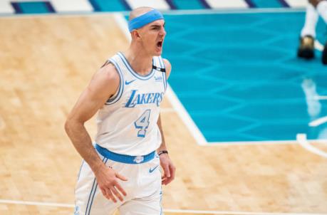 CHARLOTTE, NORTH CAROLINA - APRIL 13: Alex Caruso #4 of the Los Angeles Lakers reacts after making a 3 point shot late in the 4th quarter against the Charlotte Hornets during their game at Spectrum Center on April 13, 2021 in Charlotte, North Carolina. NOTE TO USER: User expressly acknowledges and agrees that, by downloading and or using this photograph, User is co<em></em>nsenting to the terms and co<em></em>nditions of the Getty Images License Agreement. (Photo by Jacob Kupferman/Getty Images)