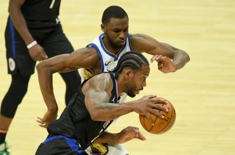 Mar 11, 2021; Los Angeles, California, USA; Los Angeles Clippers forward Kawhi Leo<em></em>nard (2) drives to the basket as he is defended by Golden State Warriors forward Andrew Wiggins (22) in the second half of the game at Staples Center. Mandatory Credit: Jayne Kamin-Oncea-USA TODAY Sports