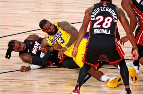 Los Angeles Lakers forward LeBron James (23) and Miami Heat forward Jae Crowder (99) go for the ball
(Kim Klement-USA TODAY Sports)