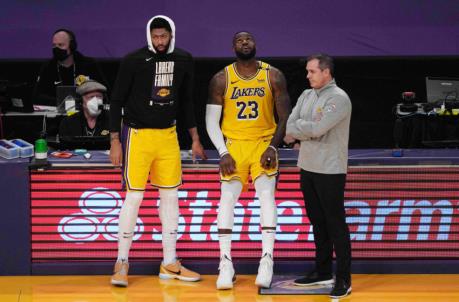 Jun 3, 2021; Los Angeles, California, USA; Los Angeles Lakers forward Anthony Davis (3), forward LeBron James (23) and coach Frank Vogel react in the second half during game six in the first round of the 2021 NBA Playoffs against the Phoenix Suns at Staples Center. Mandatory Credit: Kirby Lee-USA TODAY Sports