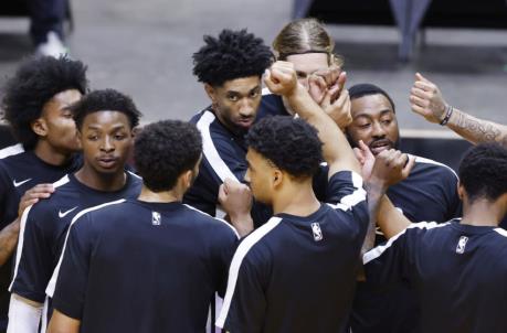 MIAMI, FLORIDA - APRIL 19: John Wall #1 of the Houston Rockets huddles with the team against the Houston Rockets prior to the game at American Airlines Arena on April 19, 2021 in Miami, Florida. NOTE TO USER: User expressly acknowledges and agrees that, by downloading and or using this photograph, User is co<em></em>nsenting to the terms and co<em></em>nditions of the Getty Images License Agreement. (Photo by Michael Reaves/Getty Images)