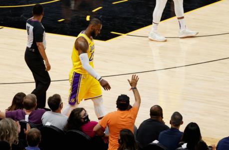 PHOENIX, ARIZONA - JUNE 01: LeBron James #23 of the Los Angeles Lakers reacts as he walks off the court during the second half in Game Five of the Western Co<em></em>nference first-round playoff series at Phoenix Suns Arena on June 01, 2021 in Phoenix, Arizona. NOTE TO USER: User expressly acknowledges and agrees that, by downloading and or using this photograph, User is co<em></em>nsenting to the terms and co<em></em>nditions of the Getty Images License Agreement. (Photo by Christian Petersen/Getty Images)