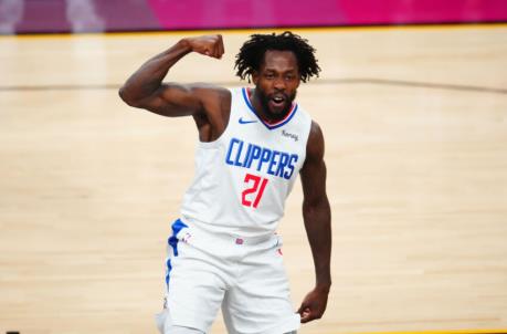 Los Angeles Clippers guard Patrick Beverley (21) flexes his muscle as he celebrates a shot against the Phoenix Suns. Mandatory Credit: Mark J. Rebilas-USA TODAY Sports