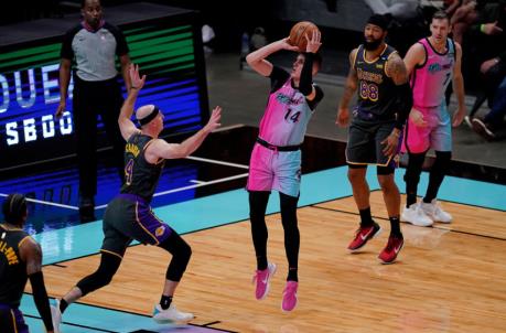 Miami Heat guard Tyler Herro (14) shoots over Los Angeles Lakers guard Alex Caruso (4) during the first half
(Jasen Vinlove-USA TODAY Sports)