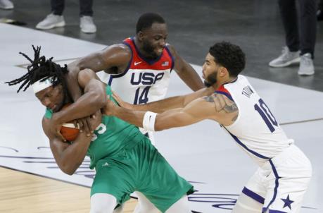 Precious Achiuwa #55 of Nigeria grabs a loose ball as he is fouled (Photo by Ethan Miller/Getty Images)