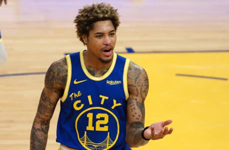 Mar 14, 2021; San Francisco, California, USA; Golden State Warriors forward-guard Kelly Oubre Jr. (12) reacts after being called for a foul against the Utah Jazz during the fourth quarter at Chase Center. Mandatory Credit: Kelley L Cox-USA TODAY Sports