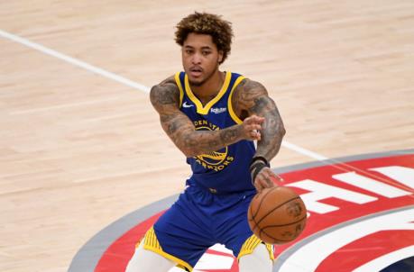 WASHINGTON, DC - APRIL 21: Kelly Oubre Jr. #12 of the Golden State Warriors passes against the Washington Wizards during the second half at Capital One Arena on April 21, 2021 in Washington, DC. NOTE TO USER: User expressly acknowledges and agrees that, by downloading and or using this photograph, User is co<em></em>nsenting to the terms and co<em></em>nditions of the Getty Images License Agreement. (Photo by Will Newton/Getty Images)