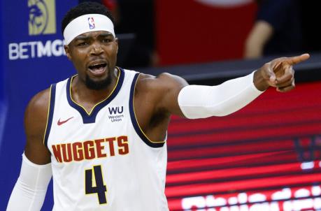 PHILADELPHIA, PENNSYLVANIA - JANUARY 09: Paul Millsap #4 of the Denver Nuggets reacts to a call during the first quarter against the Philadelphia 76ers at Wells Fargo Center on January 09, 2021 in Philadelphia, Pennsylvania. NOTE TO USER: User expressly acknowledges and agrees that, by downloading and or using this photograph, User is co<em></em>nsenting to the terms and co<em></em>nditions of the Getty Images License Agreement. (Photo by Tim Nwachukwu/Getty Images)