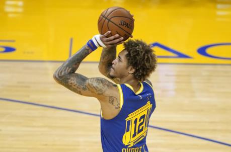 SAN FRANCISCO, CALIFORNIA - APRIL 27: Kelly Oubre Jr. #12 of the Golden State Warriors stands at the line to shoot a foul shot against the Dallas Mavericks during the first half of an NBA basketball game at Chase Center on April 27, 2021 in San Francisco, California. NOTE TO USER: User expressly acknowledges and agrees that, by downloading and or using this photograph, User is co<em></em>nsenting to the terms and co<em></em>nditions of the Getty Images License Agreement. (Photo by Thearon W. Henderson/Getty Images)