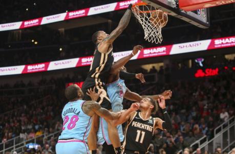 Atlanta Hawks forward John Collins (20) dunks over Miami Heat forward Jimmy Butler (22)
(Brett Davis-USA TODAY Sports)