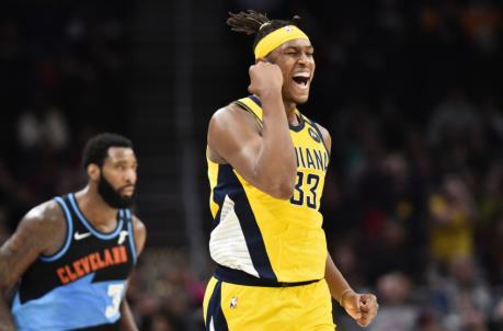 Feb 29, 2020; Cleveland, Ohio, USA; Indiana Pacers center Myles Turner (33) celebrates after hitting a three-pointer late in the second half against the Cleveland Cavaliers at Rocket Mortgage FieldHouse. Mandatory Credit: Ken Blaze-USA TODAY Sports