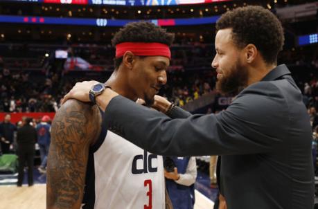 WASHINGTON, DC - FEBRUARY 03: Bradley Beal #3 of the Washington Wizards and Stephen Curry #30 of the Golden State Warriors talk after the Golden State Warriors defeated the Wizards 125-117 at Capital One Arena on February 03, 2020 in Washington, DC. NOTE TO USER: User expressly acknowledges and agrees that, by downloading and or using this photograph, User is co<em></em>nsenting to the terms and co<em></em>nditions of the Getty Images License Agreement. (Photo by Patrick McDermott/Getty Images)