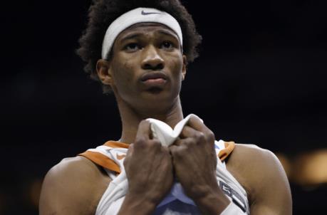 INDIANAPOLIS, INDIANA - MARCH 20: Kai Jo<em></em>nes #22 of the Texas Lo<em></em>nghorns walks off the court after a loss to Abilene Christian Wildcats 53-52 in the first round game of the 2021 NCAA Men's Basketball Tournament at Lucas Oil Stadium on March 20, 2021 in Indianapolis, Indiana. (Photo by Jamie Squire/Getty Images)