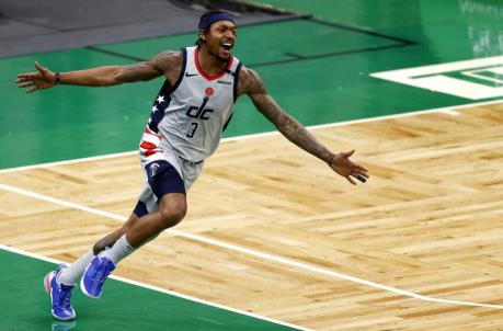 BOSTON, MASSACHUSETTS - FEBRUARY 28: Bradley Beal #3 of the Washington Wizards celebrates after scoring against the Boston Celtics during the fourth quarter at TD Garden on February 28, 2021 in Boston, Massachusetts. The Celtics defeat the Wizards 111-110. NOTE TO USER: User expressly acknowledges and agrees that, by downloading and or using this photograph, User is co<em></em>nsenting to the terms and co<em></em>nditions of the Getty Images License Agreement. (Photo by Maddie Meyer/Getty Images)