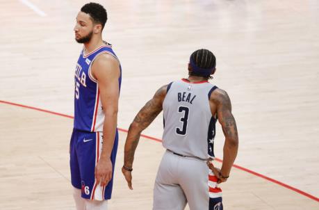 WASHINGTON, DC - MAY 31: Bradley Beal #3 of the Washington Wizards speaks to Ben Simmons #25 of the Philadelphia 76ers during the fourth quarter during Game Four of the Eastern Co<em></em>nference first round series at Capital One Arena on May 31, 2021 in Washington, DC. NOTE TO USER: User expressly acknowledges and agrees that, by downloading and or using this photograph, User is co<em></em>nsenting to the terms and co<em></em>nditions of the Getty Images License Agreement. (Photo by Tim Nwachukwu/Getty Images)