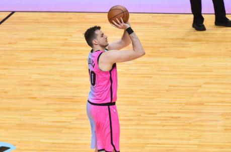 MIAMI, FL - APRIL 01: Nemanja Bjelica #70 of the Miami Heat attempts a three point shot during the second half of the game against the Golden State Warriors at American Airlines Arena on April 1, 2021 in Miami, Florida. NOTE TO USER: User expressly acknowledges and agrees that, by downloading and or using this photograph, User is co<em></em>nsenting to the terms and co<em></em>nditions of the Getty Images License Agreement.(Photo by Eric Espada/Getty Images)