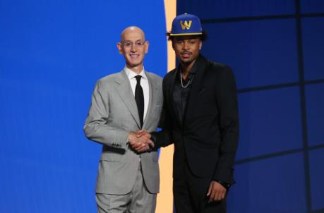 Jul 29, 2021; Brooklyn, New York, USA; Moses Moody (Arkansas) poses with NBA commissio<em></em>ner Adam Silver after being selected as the number fourteen overall pick by the Golden State Warriors in the first round of the 2021 NBA Draft at Barclays Center. Mandatory Credit: Brad Penner-USA TODAY Sports