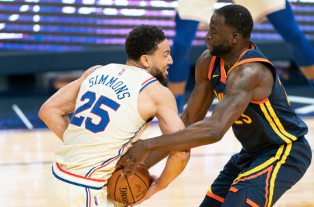 March 23, 2021; San Francisco, California, USA; Philadelphia 76ers guard Ben Simmons (25) is defended by Golden State Warriors forward Draymond Green (23) during the second quarter at Chase Center. Mandatory Credit: Kyle Terada-USA TODAY Sports