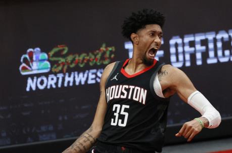 PORTLAND, OREGON - DECEMBER 26: Christian Wood #35 of the Houston Rockets reacts after his dunk against the Portland Trail Blazers during the second quarter at Moda Center on December 26, 2020 in Portland, Oregon. NOTE TO USER: User expressly acknowledges and agrees that, by downloading and/or using this photograph, user is co<em></em>nsenting to the terms and co<em></em>nditions of the Getty Images License Agreement. (Photo by Steph Chambers/Getty Images)