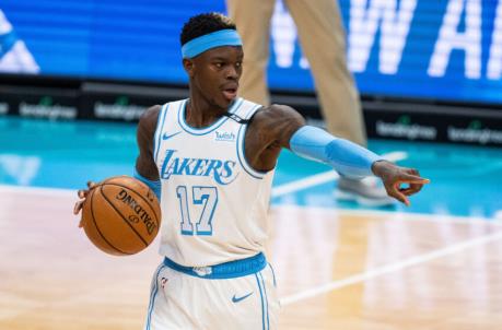 CHARLOTTE, NORTH CAROLINA - APRIL 13: Dennis Schroder #17 of the Los Angeles Lakers brings the ball up court against the Charlotte Hornets in the first half during their game at Spectrum Center on April 13, 2021 in Charlotte, North Carolina. NOTE TO USER: User expressly acknowledges and agrees that, by downloading and or using this photograph, User is co<em></em>nsenting to the terms and co<em></em>nditions of the Getty Images License Agreement. (Photo by Jacob Kupferman/Getty Images)