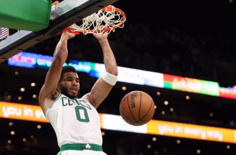 BOSTON, MASSACHUSETTS - OCTOBER 04: Jayson Tatum #0 of the Boston Celtics dunks against the Orlando Magic during the second half of the preseason game at TD Garden on October 04, 2021 in Boston, Massachusetts. NOTE TO USER: User expressly acknowledges and agrees that, by downloading and or using this photograph, user is co<em></em>nsenting to the terms and co<em></em>nditions of the Getty Images License Agreement. (Photo by Maddie Meyer/Getty Images)