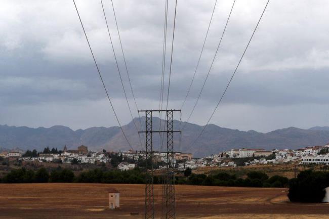 High-tension electricity towers are seen at substation on outskirts of Ronda