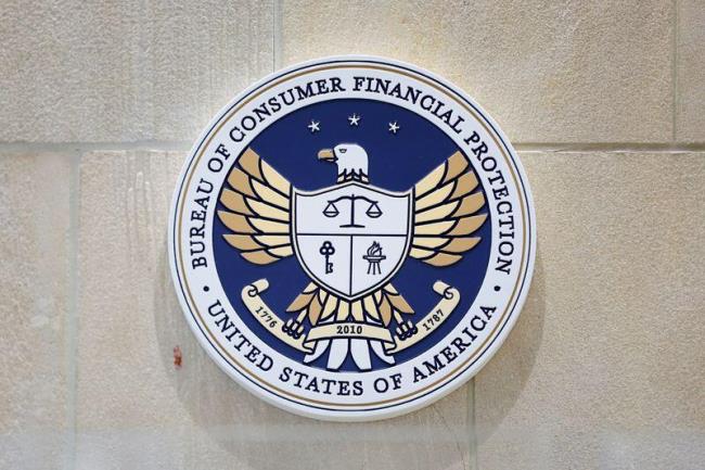 The seal of the Co<em></em>nsumer Financial Protection Bureau (CFPB) is seen at their headquarters in Washington, D.C.