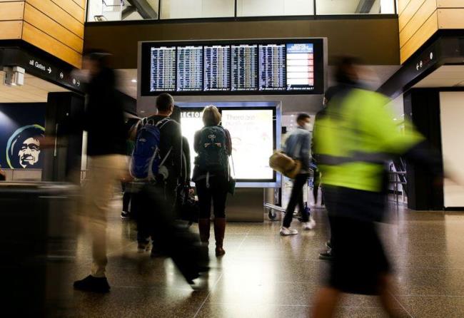 People travel before the Thanksgiving holiday in Seattle