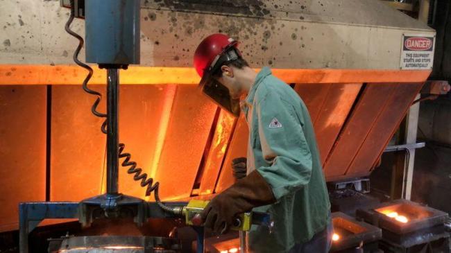 A worker pours hot me<em></em>tal at the Kirsh Foundry in Beaver Dam