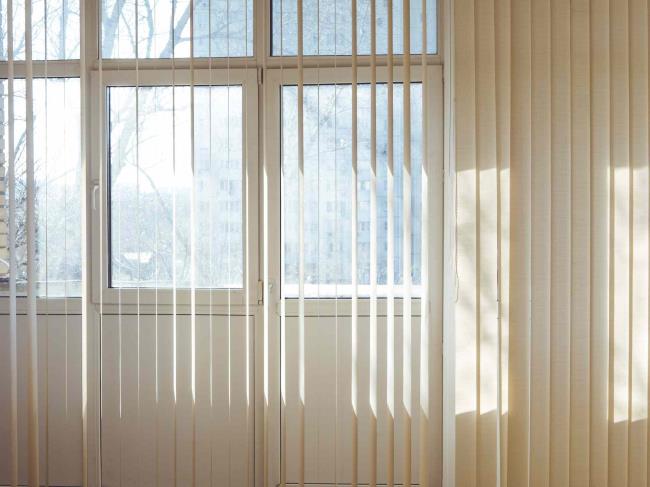 Vertical blinds in front of windows