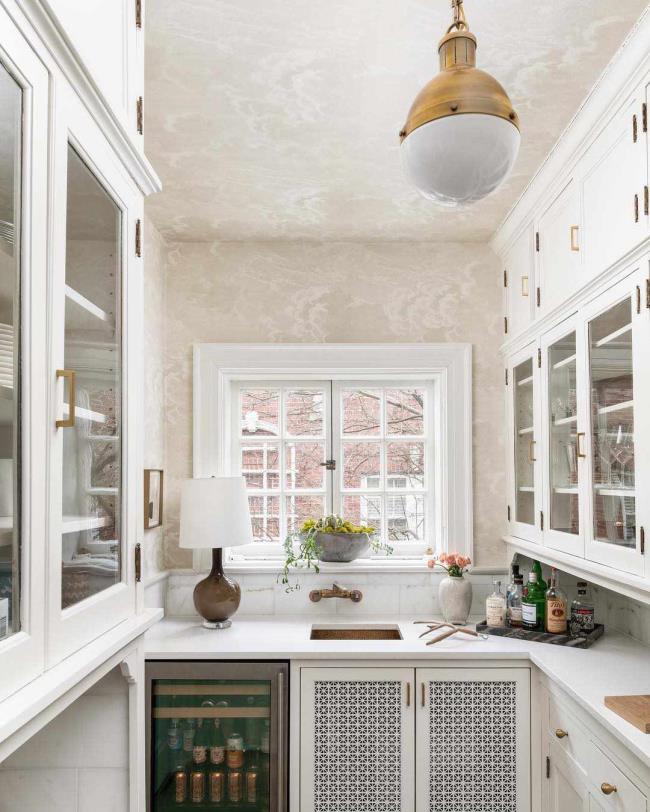 White modern butler&#39;s pantry with wine fridge